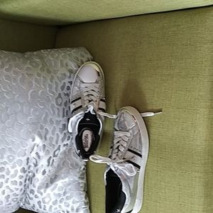 Tennis shoes with silver, white, black